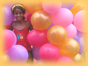 Smiling Girl with Balloons