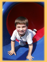 Boy in blue tube